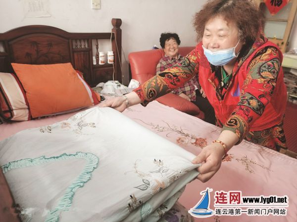 「」热心人谭宝丽：传承乐于助人好家风