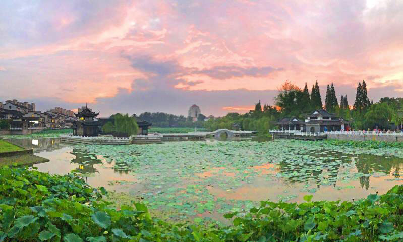 暴雨|扬城暴雨后彩虹晚霞齐刷屏 明起雨渐止 “炎值”回归！